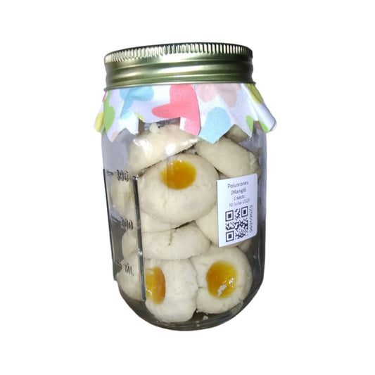 Jar of cookies with a colorful label on a plain background